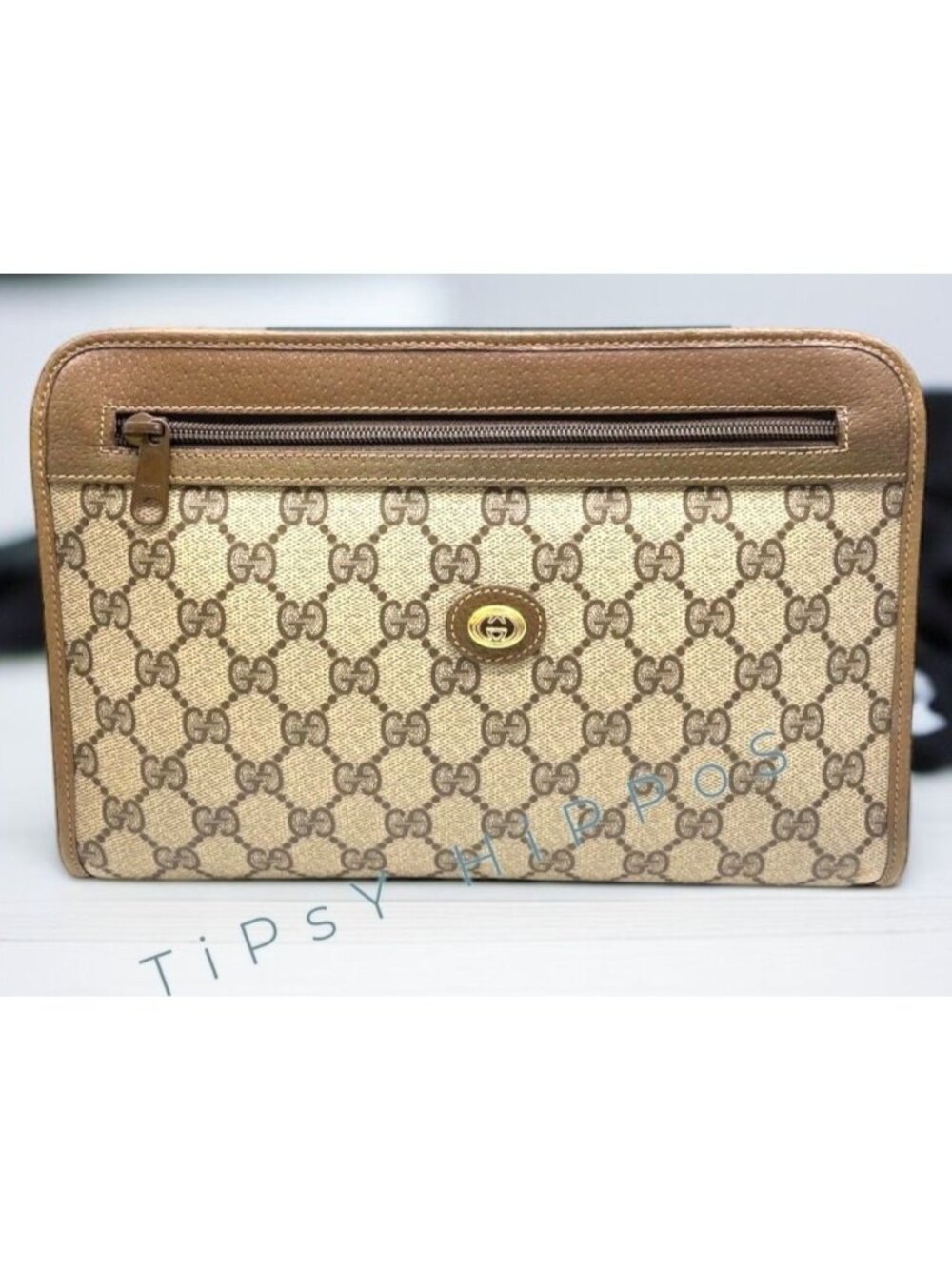 Gucci GG Supreme Monogram Brown Clutch Bag With Leather Trim - 97.01.037